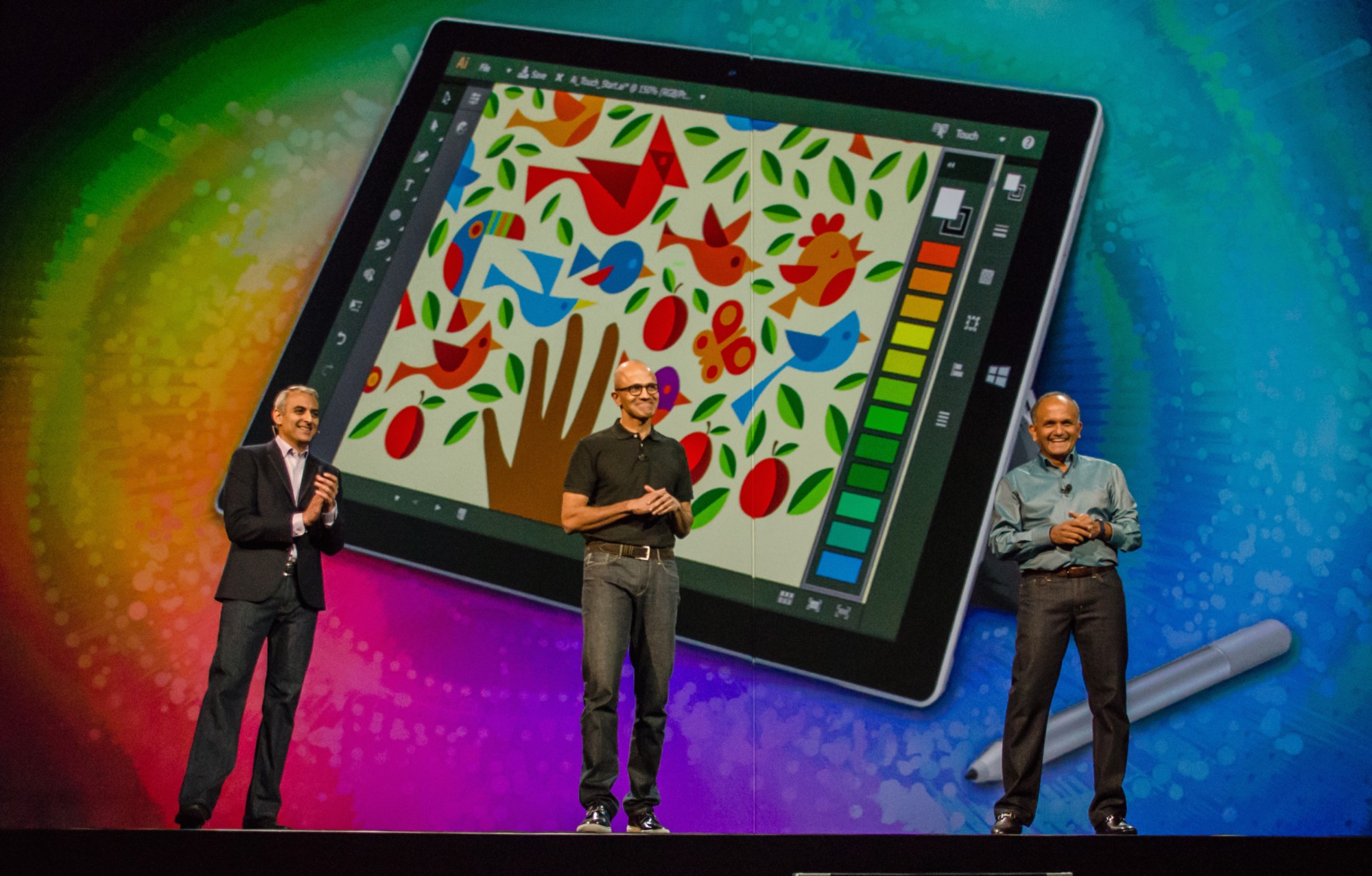 Adobe’s David Wadhwani, Microsoft CEO Satya Nadella, and Adobe CEO Shantanu Narayan onstage on October 6, 2014